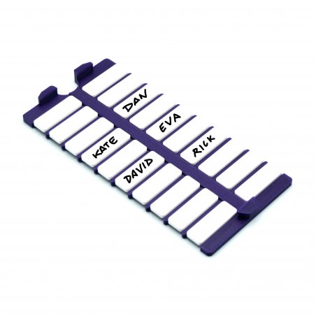 Close-up of name tag case interior showing organized slots for 20 Blood on the Clocktower tags