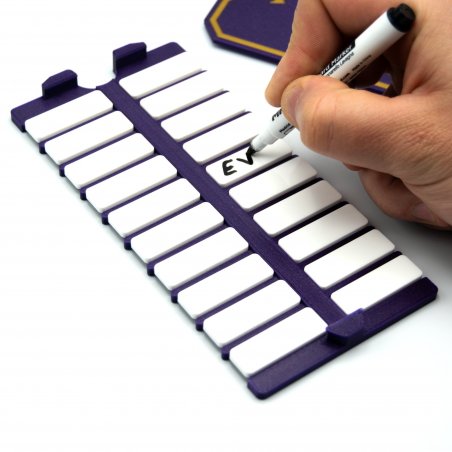 Name tag case used as writing support for player names in Blood on the Clocktower game setup